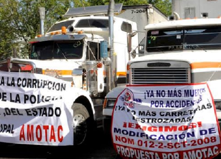 Transportistas terminan protesta; acuerdan diálogo en Gobernación